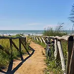 In A Modern Coastal Building Bibione